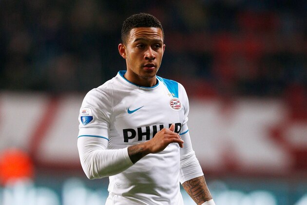 ENSCHEDE, NETHERLANDS - APRIL 04:  Memphis Depay of PSV in action during the Dutch Eredivisie match between FC Twente and PSV Eindhoven held at De Grolsch Veste Stadium on April 4, 2015 in Enschede, Netherlands.  (Photo by Dean Mouhtaropoulos/Getty Images)