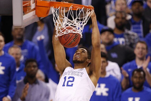 Apr 4, 2015; Indianapolis, IN, USA; Kentucky Wildcats forward Karl-Anthony Towns (12) dunks during the second half of the 2015 NCAA Men's Division I Championship semi-final game against the Wisconsin Badgers at Lucas Oil Stadium. Mandatory Credit: Brian Spurlock-USA TODAY Sports