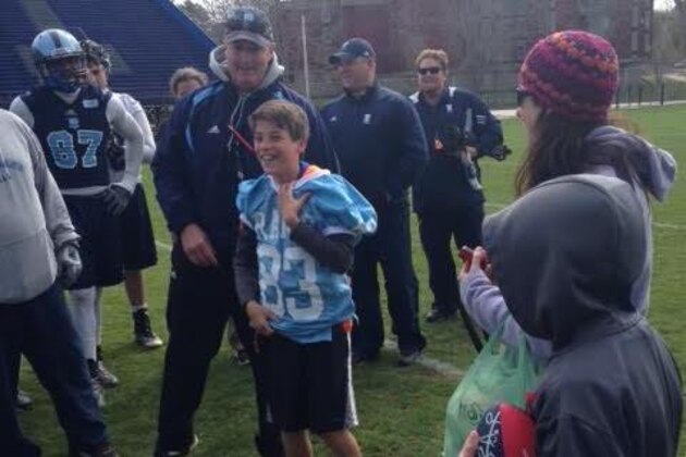 Matt Tokarski, 11, participates at the Rhode Island Rams football team's April 24 practice.
