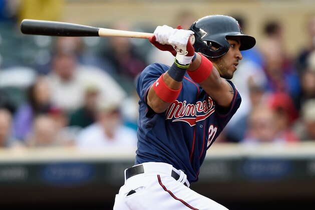MINNEAPOLIS, MN - MAY 7: Eddie Rosario #20 of the Minnesota Twins hits an RBI single against the Oakland Athletics during the fourth inning of the game on May 7, 2015 at Target Field in Minneapolis, Minnesota. The Twins defeated the Athletics 6-5. (Photo by Hannah Foslien/Getty Images)