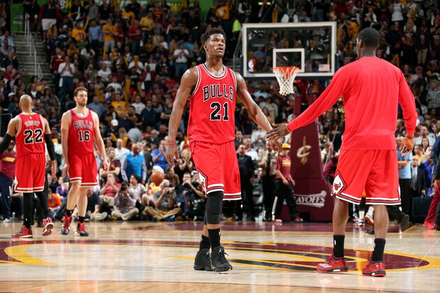 CLEVELAND, OH - MAY 6: Jimmy Butler #21 of the Chicago Bulls celebrates during a game against the Cleveland Cavaliers in Game Two of the Eastern Conference Semifinals during the 2015 NBA Playoffs on May 6, 2015 at Quicken Loans Arena in Cleveland, Ohio.  NOTE TO USER: User expressly acknowledges and agrees that, by downloading and or using this Photograph, user is consenting to the terms and conditions of the Getty Images License Agreement. Mandatory Copyright Notice: Copyright 2015 NBAE (Photo by Nathaniel S. Butler/NBAE via Getty Images)