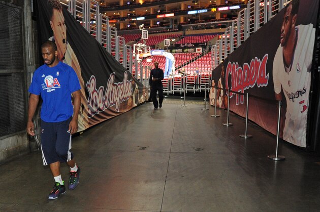 LOS ANGELES, CA - MAY 2: Chris Paul #3 of the Los Angeles Clippers walks to the locker room before a game against the San Antonio Spurs in Game Seven of the Western Conference Quarterfinals during the 2015 NBA Playoffs on May  2, 2015 at STAPLES Center in Los Angeles, California. NOTE TO USER: User expressly acknowledges and agrees that, by downloading and or using this Photograph, user is consenting to the terms and conditions of the Getty Images License Agreement. Mandatory Copyright Notice: Copyright 2015 NBAE (Photo by Andrew D. Bernstein/NBAE via Getty Images)