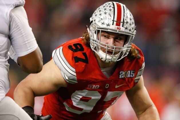 Jan 12, 2015; Arlington, TX, USA; Ohio State Buckeyes defensive lineman Joey Bosa (97) in game action against the Oregon Ducks in the 2015 CFP National Championship Game at AT&T Stadium. Ohio State won 42-20. Mandatory Credit: Tim Heitman-USA TODAY Sports