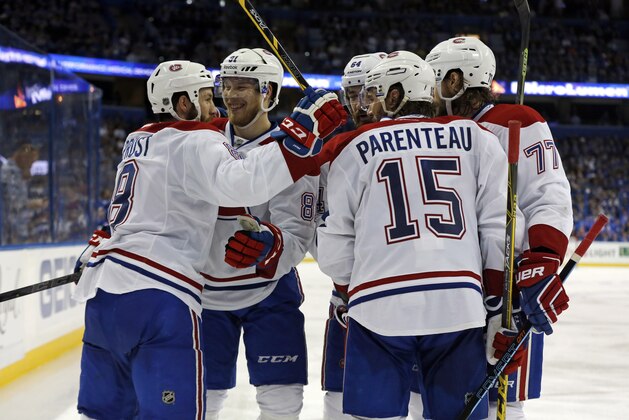 TAMPA, FL - MAY 7: Members of the Montreal Canadiens Brandon Prust #8, Lars Eller #81, Greg Pateryn #64, P.A. Parenteau #15 and Tom Gilbert #77 celebrate a goal against the Tampa Bay Lightning in Game Four of the Eastern Conference Semifinals during the 2015 NHL Stanley Cup Playoffs at Amalie Arena on May 7, 2015 in Tampa, Florida. (Photo by Mike Carlson/Getty Images)