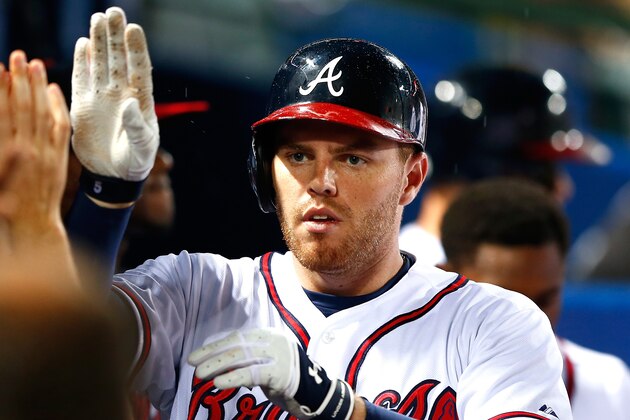ATLANTA, GA - APRIL 14:  Freddie Freeman #5 of the Atlanta Braves celebrates after hitting a solo homer in the fourth inning against the Miami Marlins at Turner Field on April 14, 2015 in Atlanta, Georgia.  (Photo by Kevin C. Cox/Getty Images)