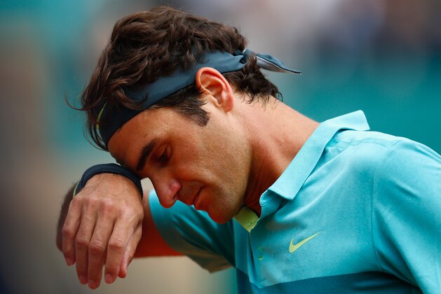 MONTE-CARLO, MONACO - APRIL 16:  Roger Federer of Switzerland looks down in his match against Gael Monfils of France during day five of the Monte Carlo Rolex Masters tennis at the Monte-Carlo Sporting Club on April 16, 2015 in Monte-Carlo, Monaco.  (Photo by Julian Finney/Getty Images)