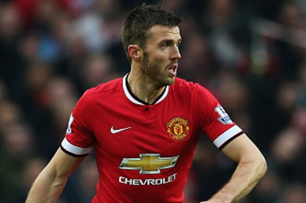 MANCHESTER, ENGLAND - NOVEMBER 29:  Michael Carrick of Manchester United in action during the Barclays Premier League match between Manchester United and Hull City at Old Trafford on November 29, 2014 in Manchester, England.  (Photo by Matthew Lewis/Getty Images)