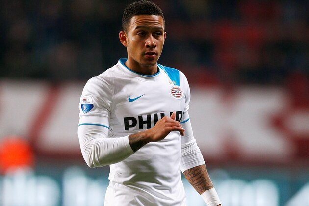 ENSCHEDE, NETHERLANDS - APRIL 04:  Memphis Depay of PSV in action during the Dutch Eredivisie match between FC Twente and PSV Eindhoven held at De Grolsch Veste Stadium on April 4, 2015 in Enschede, Netherlands.  (Photo by Dean Mouhtaropoulos/Getty Images)