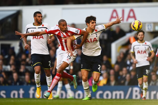 LONDON, ENGLAND - NOVEMBER 09:  Steven N'Zonzi of Stoke City and Federico Fazio of Spurs compete for the ball during the Barclays Premier League match between Tottenham Hotspur and Stoke City at White Hart Lane on November 9, 2014 in London, England.  (Photo by Shaun Botterill/Getty Images)