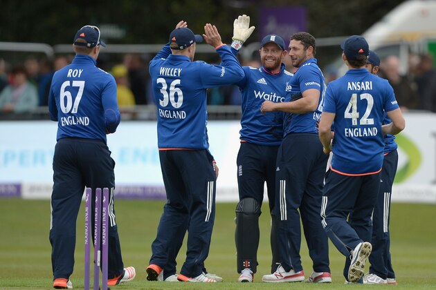 MALAHIDE, IRELAND - MAY 08:  Jonathan Baistow of England celebrates with teammates after running out Paul Stirling of Ireland during the Royal London One Day International between Ireland and England at Malahide Cricket Club on May 8, 2015 in Malahide, Ireland.  (Photo by Gareth Copley/Getty Images)