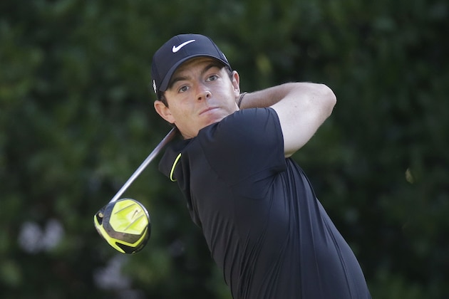 Rory McIlroy, of Northern Ireland, hits from the 10th tee during the first round of The Players Championship golf tournament Thursday, May 7, 2015, in Ponte Vedra Beach, Fla., Fla. (AP Photo/John Raoux)