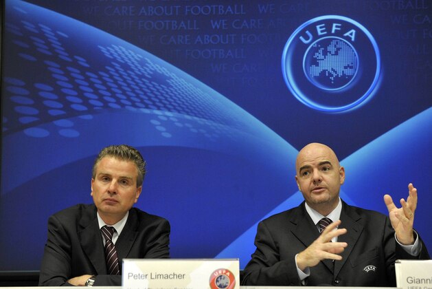 Peter Limacher, left, Head of Disciplinary Services of the UEFA and Gianni Infantino, right, UEFA General Secretary,  speak  during a press conference at the UEFA headquarters in Nyon, Switzerland, Wednesday, Nov. 25, 2009. The federations concerned of the current match fixing cases have been convoked to UEFA's headquarters for a meeting. (AP Photo/Keystone/Dominic Favre)