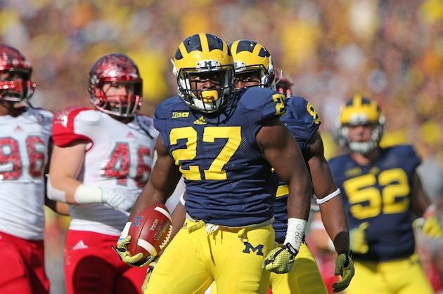 ANN ARBOR, MI - SEPTEMBER 13: Derrick Green #27 of the Michigan Wolverines scores on a one yard run during the first half of the game against Miami University Redhawks at Michigan Stadium on September 13, 2014 in Ann Arbor, Michigan.  (Photo by Leon Halip/Getty Images)