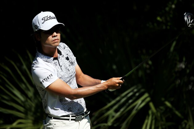 PONTE VEDRA BEACH, FL - MAY 08:  Kevin Na plays his shot from the fifth tee during round two of THE PLAYERS Championship at the TPC Sawgrass Stadium course on May 8, 2015 in Ponte Vedra Beach, Florida.  (Photo by Mike Ehrmann/Getty Images)