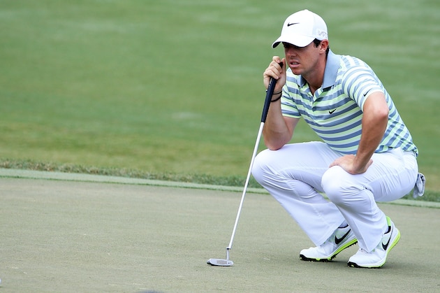 PONTE VEDRA BEACH, FL - MAY 08:  Rory McIlroy of Northern Ireland lines up a putt on the fourth green during round two of THE PLAYERS Championship at the TPC Sawgrass Stadium course on May 8, 2015 in Ponte Vedra Beach, Florida.  (Photo by Sam Greenwood/Getty Images)