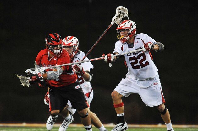 TOWSON, MD-JUNE 27: Chris Lightner #22 of the Boys All America South team defends during the Under Armour Lacrosse Classic at Johnny Unitas Stadium on June 27, 2009 in Towson, Maryland. The South defeated the North 19-16. (Photo by Larry French/Getty Images for Under Armour)