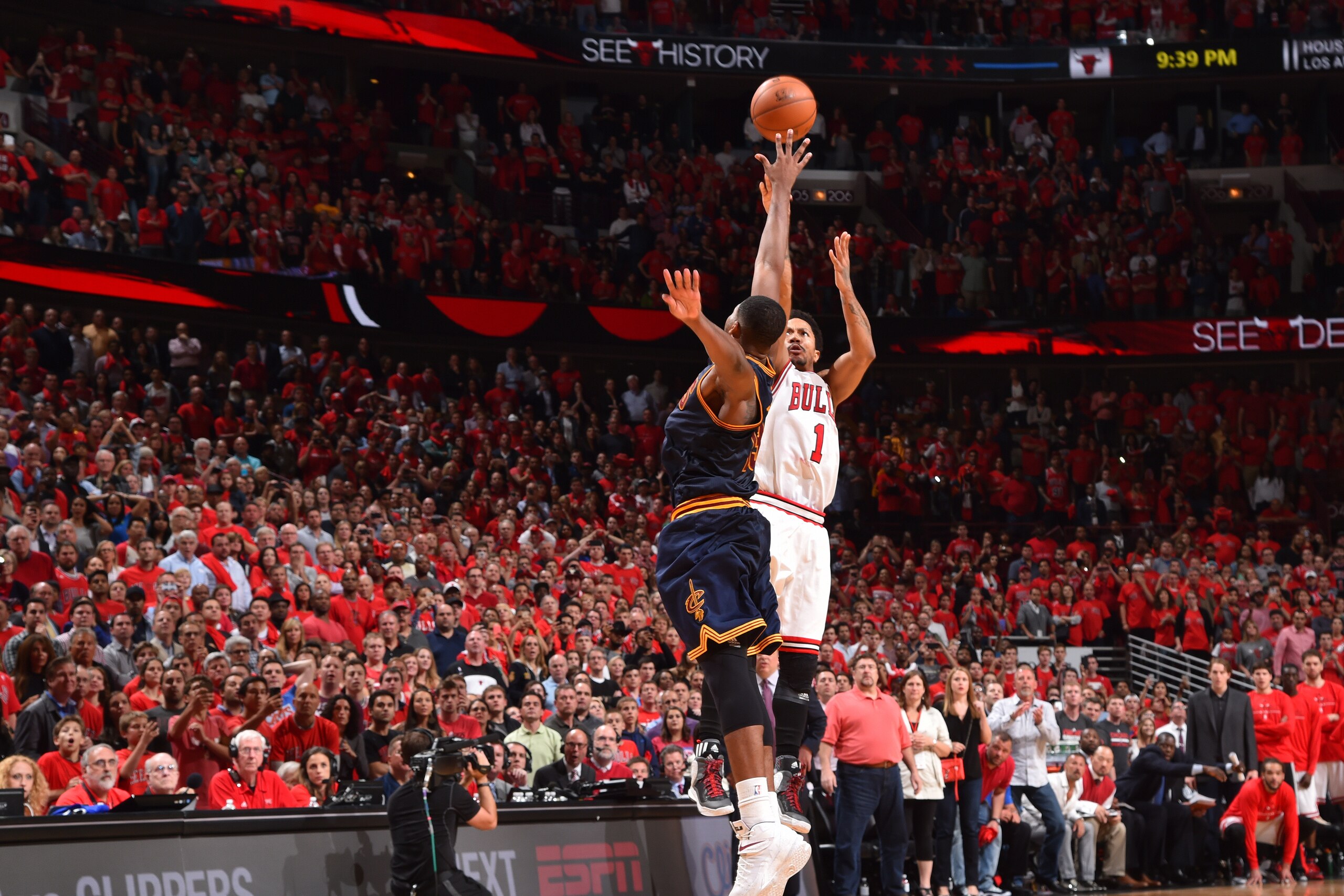 CHICAGO,IL : Derrick Rose #1 of the Chicago Bulls hits the game winning three pointer with three seconds left in the game against the Cleveland Cavaliers at the United Center During Game Two of the Eastern Conference Semifinals during the 2015 NBA Playoffs on May 8, 2015 in Chicago,Illinois NOTE TO USER: User expressly acknowledges and agrees that, by downloading and/or using this Photograph, user is consenting to the terms and conditions of the Getty Images License Agreement. Mandatory Copyright Notice: Copyright 2015 NBAE (Photo by Jesse D. Garrabrant/NBAE via Getty Images)