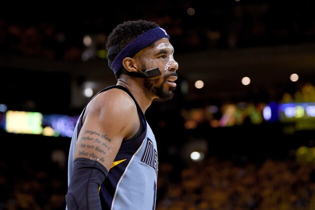 OAKLAND, CA - MAY 05:  Mike Conley #11 of the Memphis Grizzlies looks on during a break in the action against the Golden State Warriors in the fourth quarter of Game Two of the Western Conference Semifinals of the NBA Playoffs at ORACLE Arena on May 5, 2015 in Oakland, California. NOTE TO USER: User expressly acknowledges and agrees that, by downloading and or using this photograph, User is consenting to the terms and conditions of the Getty Images License Agreement.  (Photo by Thearon W. Henderson/Getty Images)