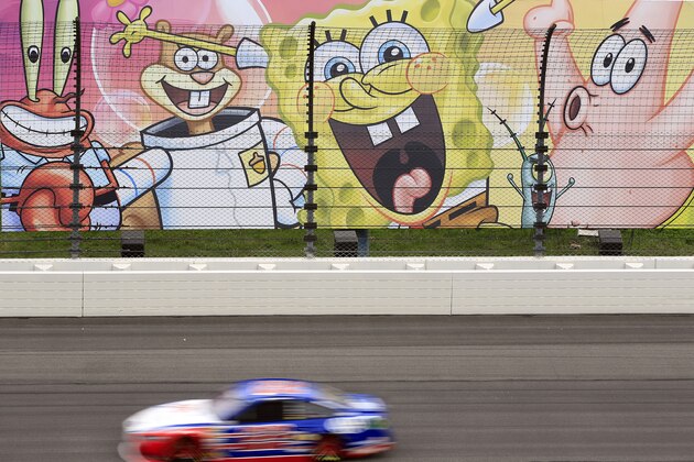 KANSAS CITY, KS - MAY 08: Joey Logano, driver of the #22 AAA Insurance Ford, races during qualifying for the NASCAR Sprint Cup Series SpongeBob SquarePants 400 at Kansas Speedway on May 8, 2015 in Kansas City, Kansas.  (Photo by Jamie Squire/Getty Images)