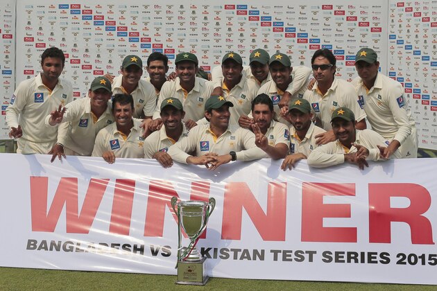 Pakistan’s cricket players pose for a group photograph with the winner's trophy for their series against Bangladesh in Dhaka, Bangladesh Saturday, May 9, 2015. (AP Photo/ A.M. Ahad)