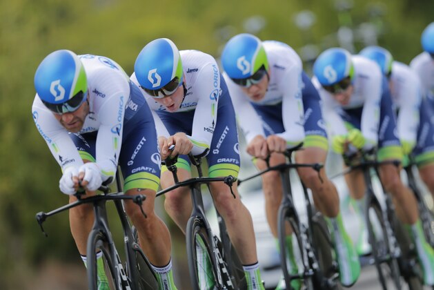 Australia's Orica GreenEDGE team competes to take a silver medal during the men's team trial event over 57.1 kilometers (35.5 miles) at the Road Cycling World Championships in Ponferrada, north-western Spain, Sunday Sept. 21, 2014. (AP Photo/Daniel Ochoa de Olza)