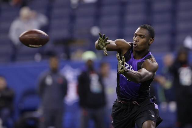 Miami defensive back Ladarius Gunter runs a drill at the NFL football scouting combine in Indianapolis, Monday, Feb. 23, 2015. (AP Photo/David J. Phillip)