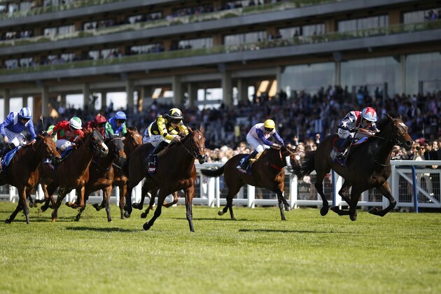 ASCOT, ENGLAND - MAY 09:  Jamie Spencer riding Speculative Bid (R) win The totescoop6 Victoria Cup at Ascot racecourse on May 09, 2015 in Ascot, England. (Photo by Alan Crowhurst/Getty Images)