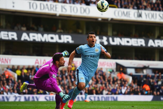 LONDON, ENGLAND - MAY 03:  Sergio Aguero of Manchester City evades Hugo Lloris of Spurs during the Barclays Premier League match between Tottenham Hotspur and Manchester City at White Hart Lane on May 3, 2015 in London, England.  (Photo by Shaun Botterill/Getty Images)