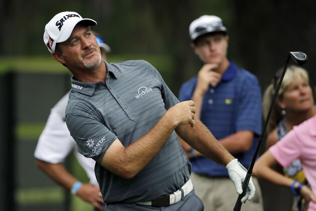 Jerry Kelly follows his shot from the eighth tee during the second round of The Players Championship golf tournament Friday, May 8, 2015, in Ponte Vedra Beach, Fla. (AP Photo/Chris O'Meara)