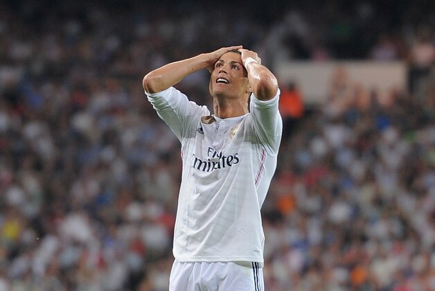 MADRID, SPAIN - MAY 09:  Cristiano Ronaldo of Real Madrid CF reacts after failing to score from a free kick during the La Liga match between Real Madrid CF and Valencia CF at Estadio Santiago Bernabeu on May 9, 2015 in Madrid, Spain.  (Photo by Denis Doyle/Getty Images)