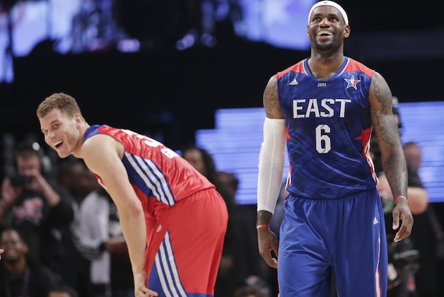 West Team's Blake Griffin of the Los Angeles Clippers and East Team's LeBron James of the Miamia Heat laugh during the first half of the NBA All-Star basketball game Sunday, Feb. 17, 2013, in Houston. (AP Photo/Eric Gay)