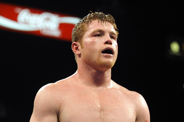 Mar 8, 2014; Las Vegas, NV, USA; Saul Alvarez reacts after the referee stops the fight against Alfredo Angulo during their super welterweight main event bout at MGM Grand Arena. Mandatory Credit: Stephen R. Sylvanie-USA TODAY Sports