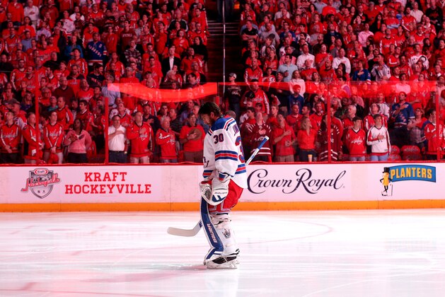 WASHINGTON, DC - MAY 04: Goalie Henrik Lundqvist #30 of the New York Rangers looks on during the national anthem before playing the Washington Capitals in Game Three of the Eastern Conference Semifinals during the 2015 NHL Stanley Cup Playoffs at Verizon Center on May 4, 2015 in Washington, DC. (Photo by Patrick Smith/Getty Images)