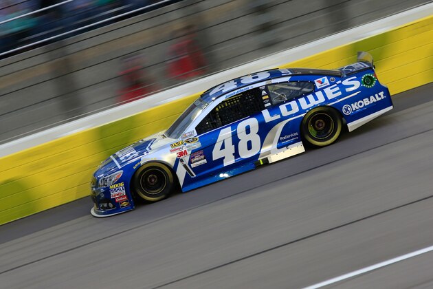 KANSAS CITY, KS - MAY 09: Jimmie Johnson, driver of the #48 Lowe's Chevrolet, races during the NASCAR Sprint Cup Series SpongeBob SquarePants 400 at Kansas Speedway on May 9, 2015 in Kansas City, Kansas.  (Photo by Jamie Squire/Getty Images)