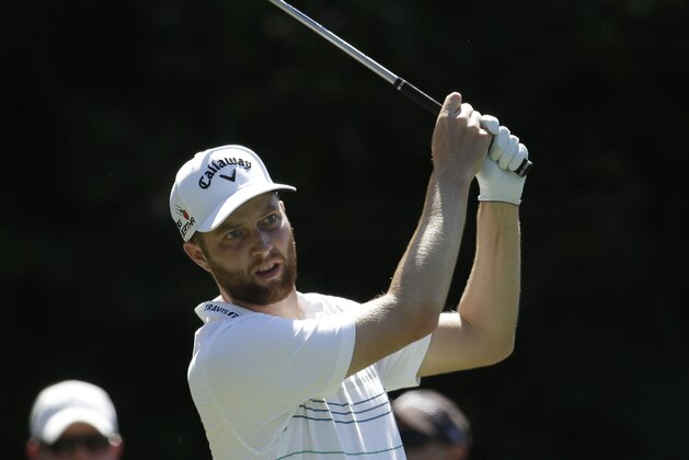 Chris Kirk hits from the seventh tee during the third round of The Players Championship golf tournament Saturday, May 9, 2015, in Ponte Vedra Beach, Fla. (AP Photo/Lynne Sladky)