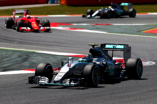 MONTMELO, SPAIN - MAY 10:  Nico Rosberg of Germany and Mercedes GP leads Sebastian Vettel of Germany and Ferrari and Lewis Hamilton of Great Britain and Mercedes GP during the Spanish Formula One Grand Prix at Circuit de Catalunya on May 10, 2015 in Montmelo, Spain.  (Photo by Dan Istitene/Getty Images)