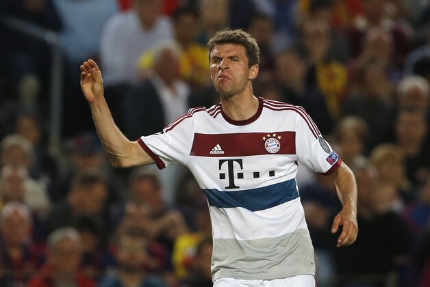 Bayern's Thomas Mueller gestures during the Champions League semifinal first leg soccer match between Barcelona and Bayern Munich at the Camp Nou stadium in Barcelona, Spain, Wednesday, May 6, 2015.  (AP Photo/Emilio Morenatti)