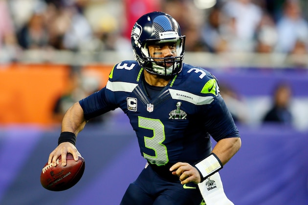 GLENDALE, AZ - FEBRUARY 01:  Russell Wilson #3 of the Seattle Seahawks looks to pass in the first quarter against the New England Patriots during Super Bowl XLIX at University of Phoenix Stadium on February 1, 2015 in Glendale, Arizona.  (Photo by Kevin C. Cox/Getty Images)