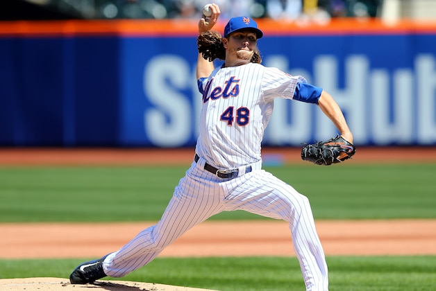 NEW YORK, NY - APRIL 13:  Jacob deGrom #48 of the New York Mets delivers a pitch in the first inning against the Philadelphia Phillies during Opening Day on April 13,2015 at Citi Field in the Flushing neighborhood of the Queens borough of New York City.  (Photo by Elsa/Getty Images)