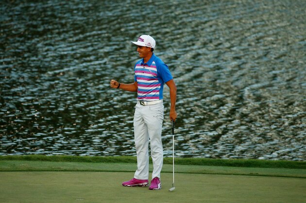 PONTE VEDRA BEACH, FL - MAY 10:  Rickie Fowler celebrates as he wins the playoff in the final round of THE PLAYERS Championship at the TPC Sawgrass Stadium course on May 10, 2015 in Ponte Vedra Beach, Florida.  (Photo by Richard Heathcote/Getty Images)