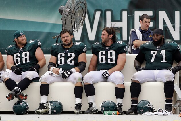 PHILADELPHIA, PA - SEPTEMBER 25: Offensive players  Kyle DeVan #68, Jason Kelce #62, Evan Mathis #69, and Jason Peters #71 of the Philadelphia Eagles sit on the bench during the fourth quarter against the New York Giants at Lincoln Financial Field on September 25, 2011 in Philadelphia, Pennsylvania. The Giants defeated the Eagles 29-16. (Photo by Rob Carr/Getty Images)
