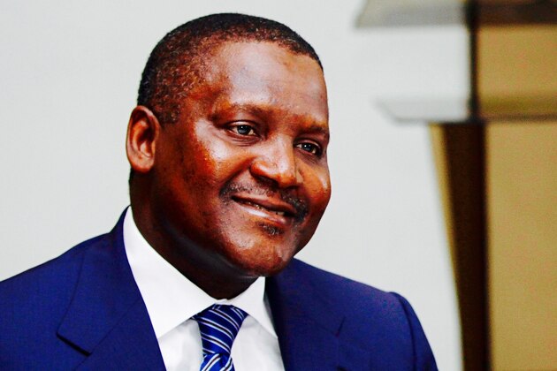 FILE -  In this photo taken, Monday, Oct. 8, 2012 Nigerian billionaire businessman Aliko Dangote  attends  a global business environment meeting in Lagos, Nigeria. Forbes magazine says Dangote, a Nigerian tycoon who built his empire on commodities like flour, sugar and cement, is Africa’s richest man. Dangote topped the Forbes’ list published this week for the second year running. According to Forbes, he has a net worth of $12 billion. (Ap Photo/Sunday Alamba, file)