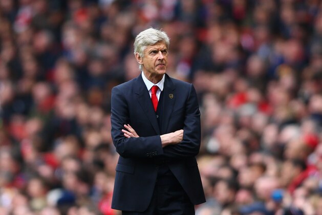 LONDON, ENGLAND - APRIL 26:  Arsene Wenger manager of Arsenal looks thoughtful during the Barclays Premier League match between Arsenal and Chelsea at Emirates Stadium on April 26, 2015 in London, England.  (Photo by Paul Gilham/Getty Images)