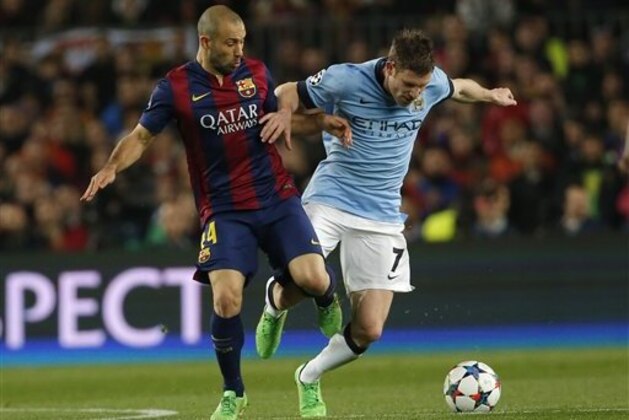 Manchester City's James Milner, right, and Barcelona's Javier Mascherano fight for the ball during a Champions League round of 16 second leg, soccer match between FC Barcelona and Manchester City at Camp Nou stadium, in Barcelona, Spain, Wednesday, March 18, 2015. A surging Barcelona has overhauled Real Madrid in the Spanish league standings, and the team now has the chance to open up a significant gap in the second