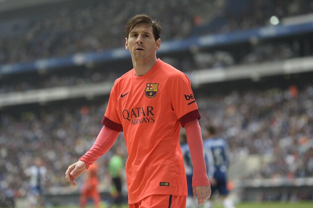 FC Barcelona's Lionel Messi, from Argentina, looks on during a Spanish La Liga soccer match against Espanyol at Cornella-El Prat stadium in Cornella Llobregat, Spain, Saturday, April 25, 2015. (AP Photo/Manu Fernandez)