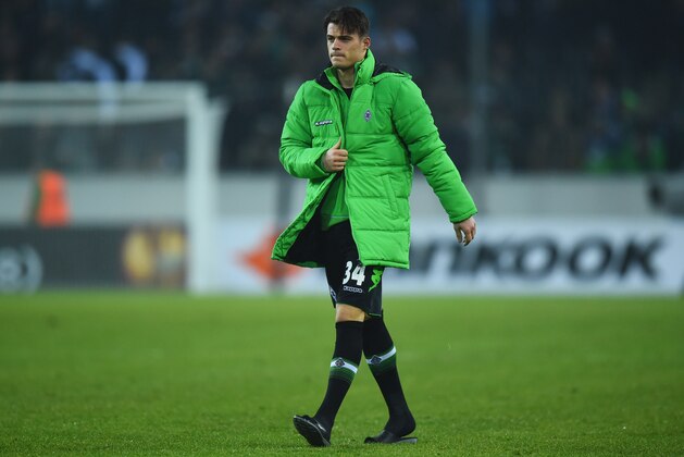 MOENCHENGLADBACH, GERMANY - FEBRUARY 26:  Granit Xhaka of Borussia Moenchengladbach looks dejected in defeat after the UEFA Europa League Round of 32 second leg match between Borussia Moenchengladbach and FC Sevilla at Borussia-Park on February 26, 2015 in Moenchengladbach, Germany.  (Photo by Lars Baron/Getty Images)