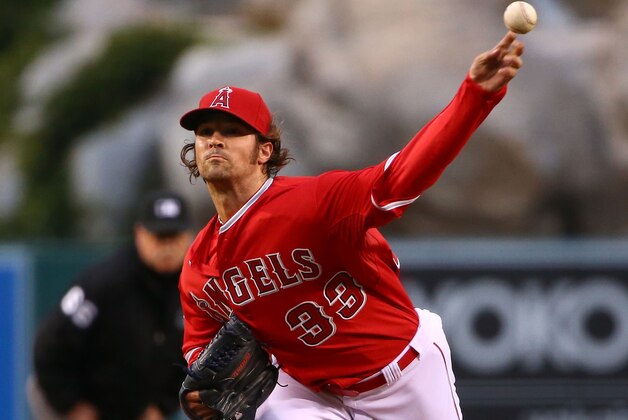 ANAHEIM, CA - MAY 06:  C.J. Wilson #33 of the Los Angeles Angels of Anaheim pitches in the first inning during the MLB game against the Seattle Mariners at Angel Stadium of Anaheim on May 6, 2015 in Anaheim, California.  (Photo by Victor Decolongon/Getty Images)