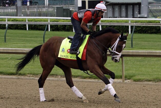 Danzig Moon, ridden by exercise rider William Cano, gallops at Churchill Downs in Louisville, Ky., Thursday, April 30, 2015.  (AP Photo/Garry Jones)