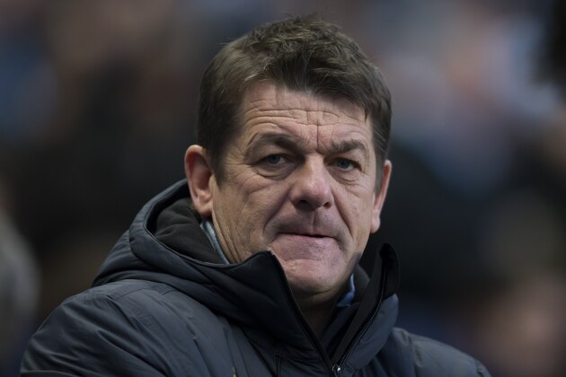Newcastle's manager John Carver takes to the touchline before his team's English Premier League soccer match between Manchester City and Newcastle at the Etihad Stadium, Manchester, England, Saturday Feb. 21, 2015. (AP Photo/Jon Super)