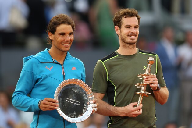 MADRID, SPAIN - MAY 10:  Andy Murray of Great Britain poses with his winners trophy after his straight sets victory against Rafael Nadal of Spain  in the mens final during day nine of the Mutua Madrid Open tennis tournament at the Caja Magica  on May 10, 2015 in Madrid, Spain.  (Photo by Clive Brunskill/Getty Images)